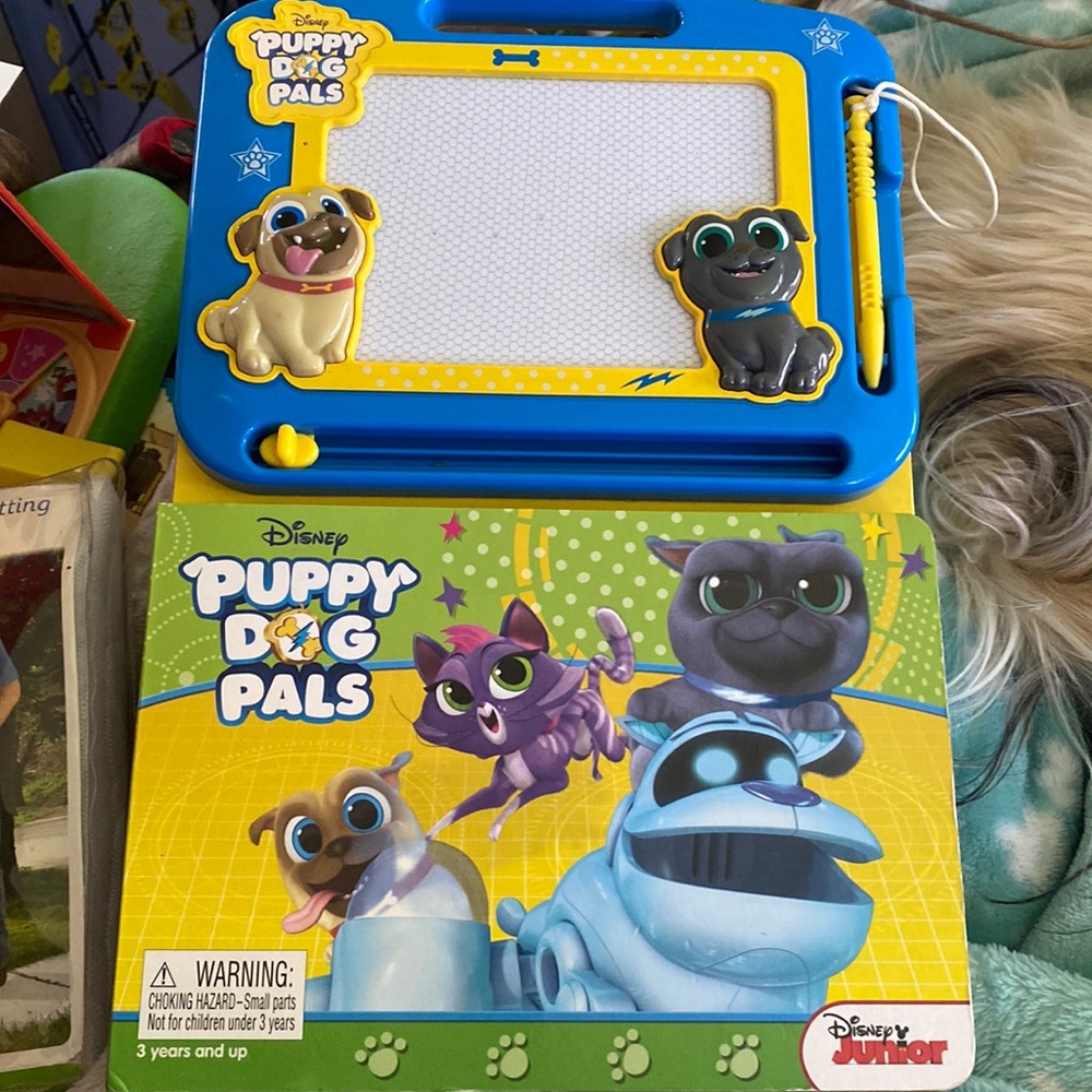 Like new puppy dog pals drawing book with etch a sketch attached